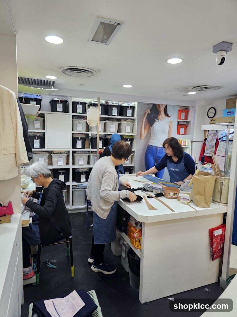 Tailors working in a shop