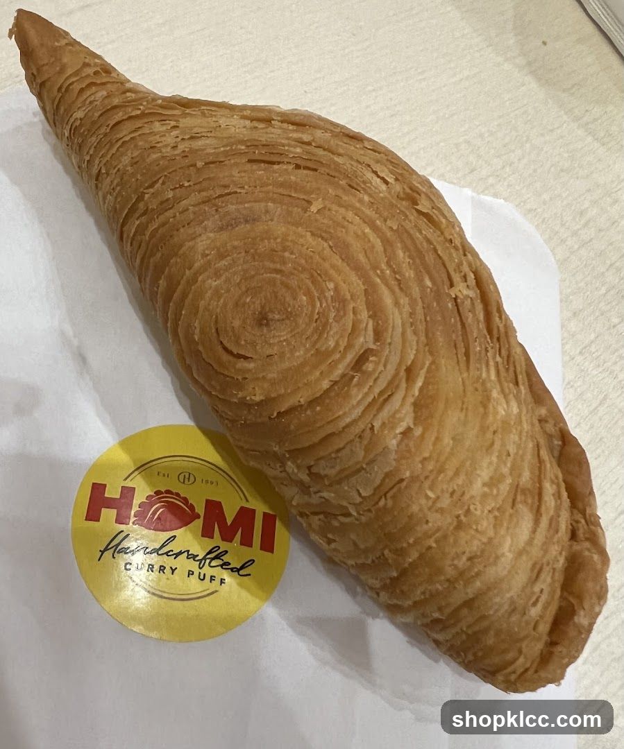 Curry Puff with Homi Logo