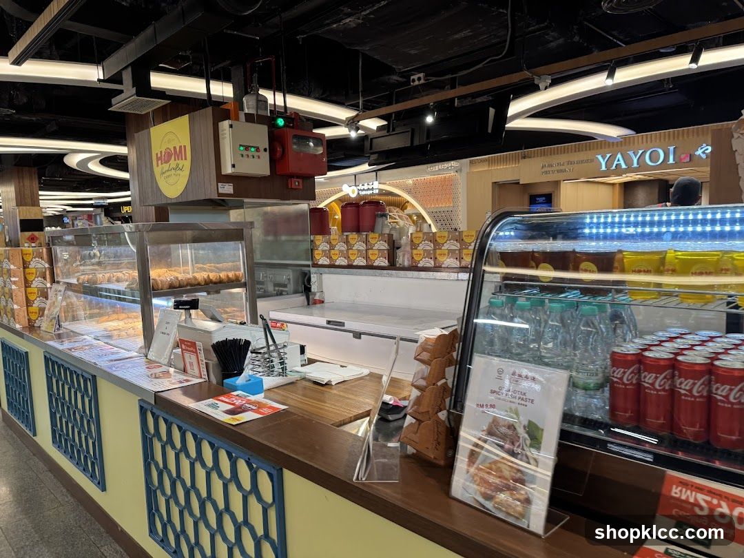 Food stall counter with baked goods and drinks