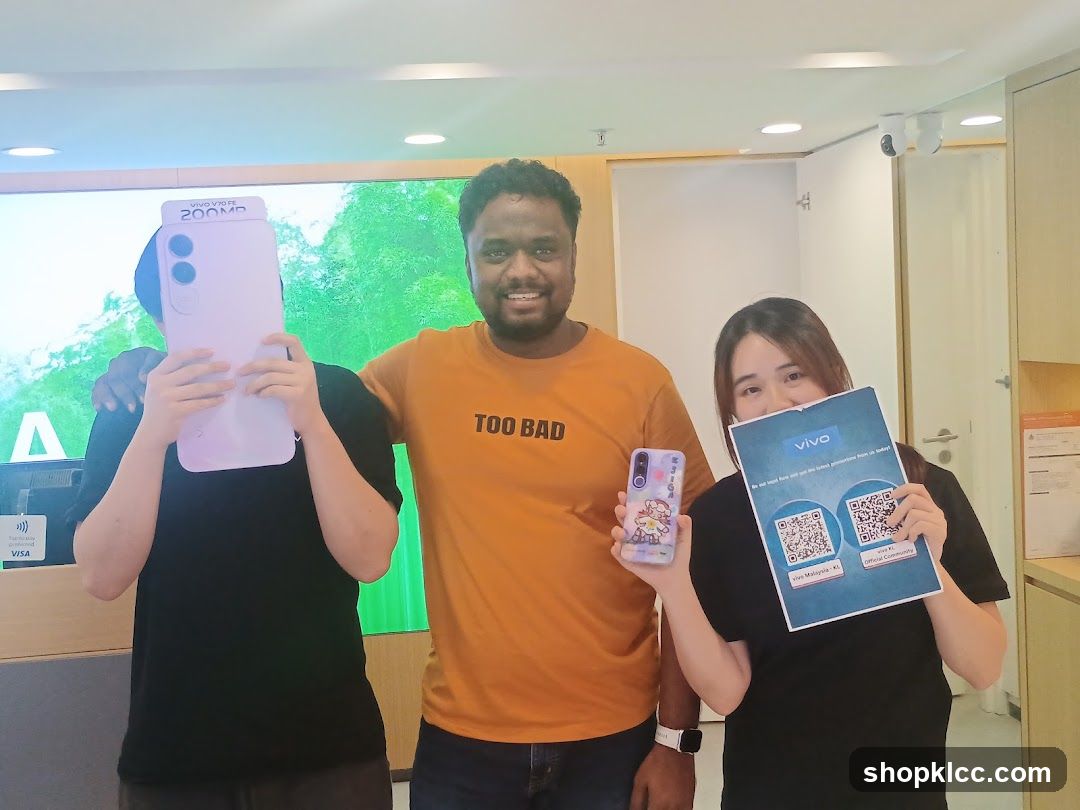 People holding promotional items