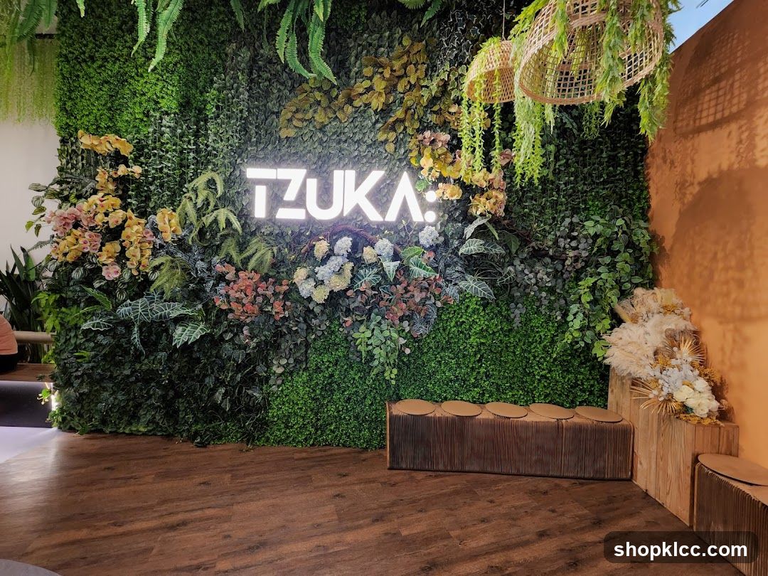 TZUKA Logo on a Green Wall