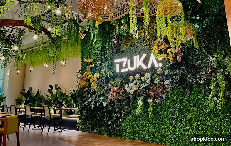 Restaurant Interior with Green Wall and Neon Sign