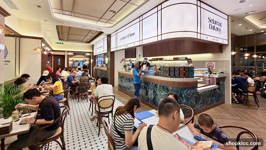 Interior of a busy cafe with customers dining