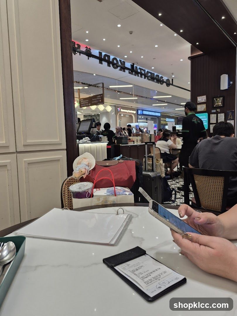 Cafe Interior with Customers and Signage