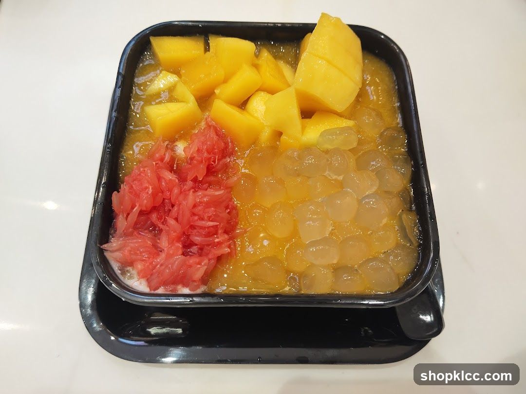Mango dessert with grapefruit and boba