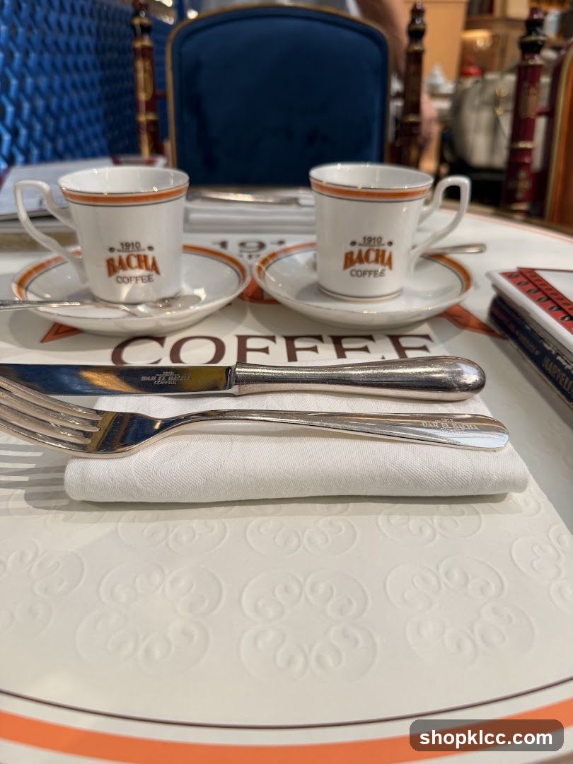 Coffee cups and cutlery on a table