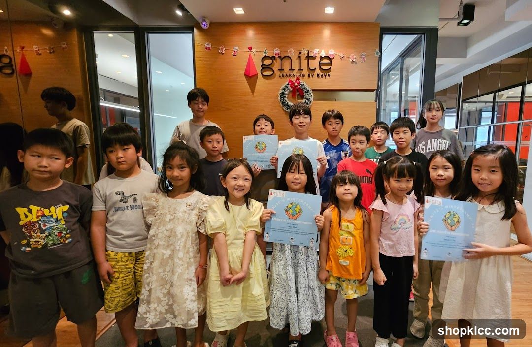 Children holding certificates