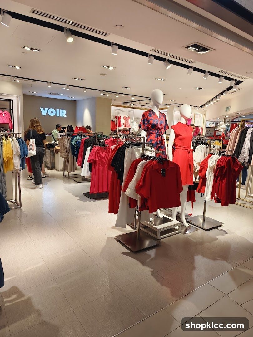 Clothing store interior with mannequins and clothing racks