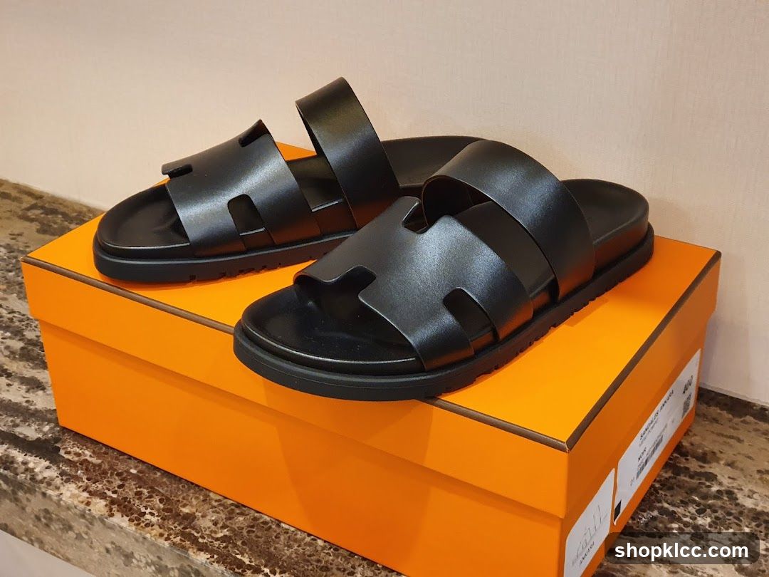 Black Hermes Sandals on Orange Box