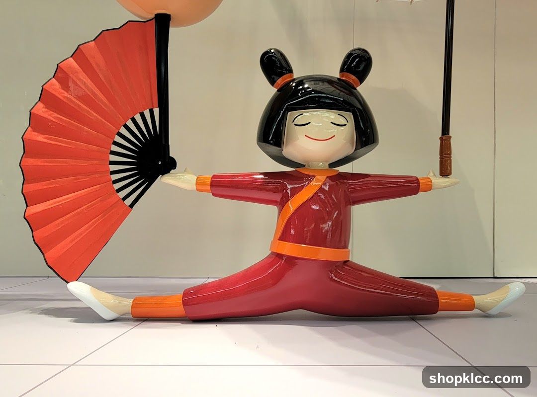 Statue of a Girl with Fan and Umbrella