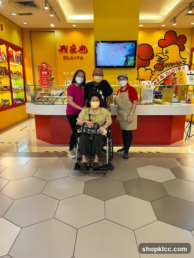 Family Poses in Front of Oloiya Store
