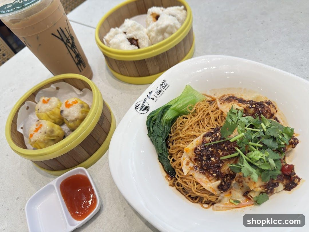 Noodle Dish with Dim Sum and Drink
