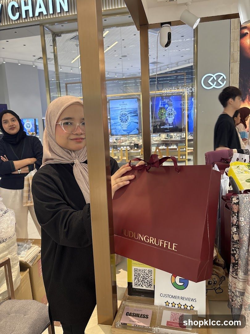 Woman Holding Shopping Bag