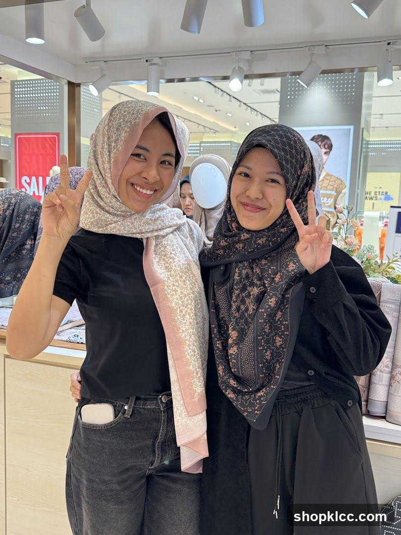 Two Women Posing in a Store