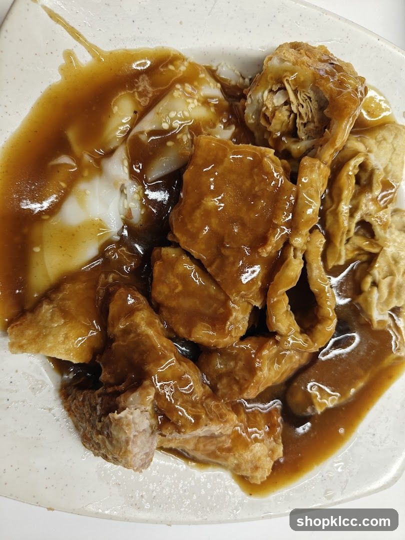Fried Tofu and Meat Dish with Gravy