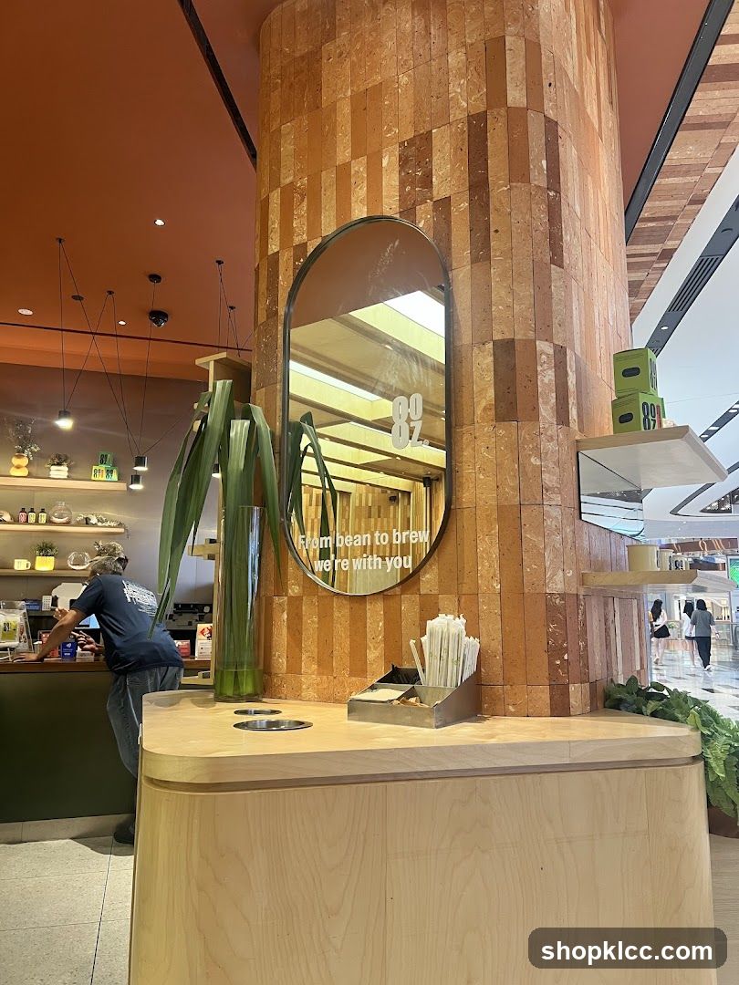 Coffee shop interior with a mirror and plants