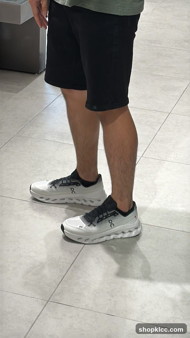Man wearing white running shoes