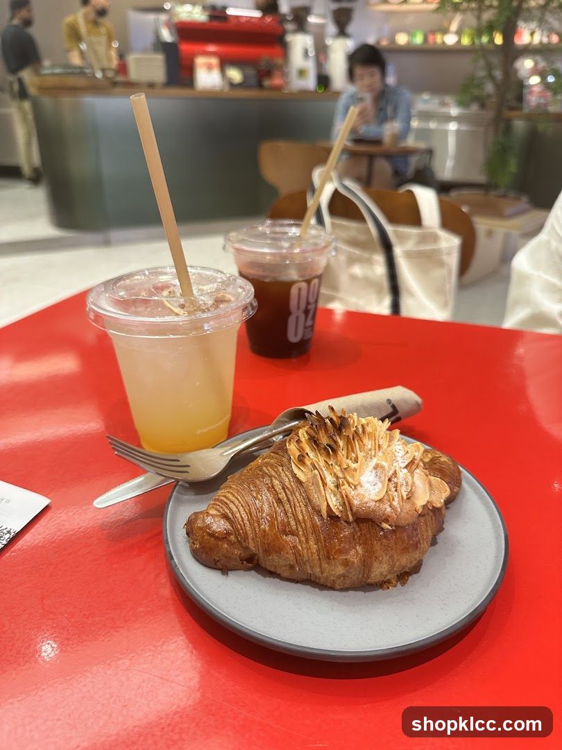 Croissant and Drinks at a Cafe