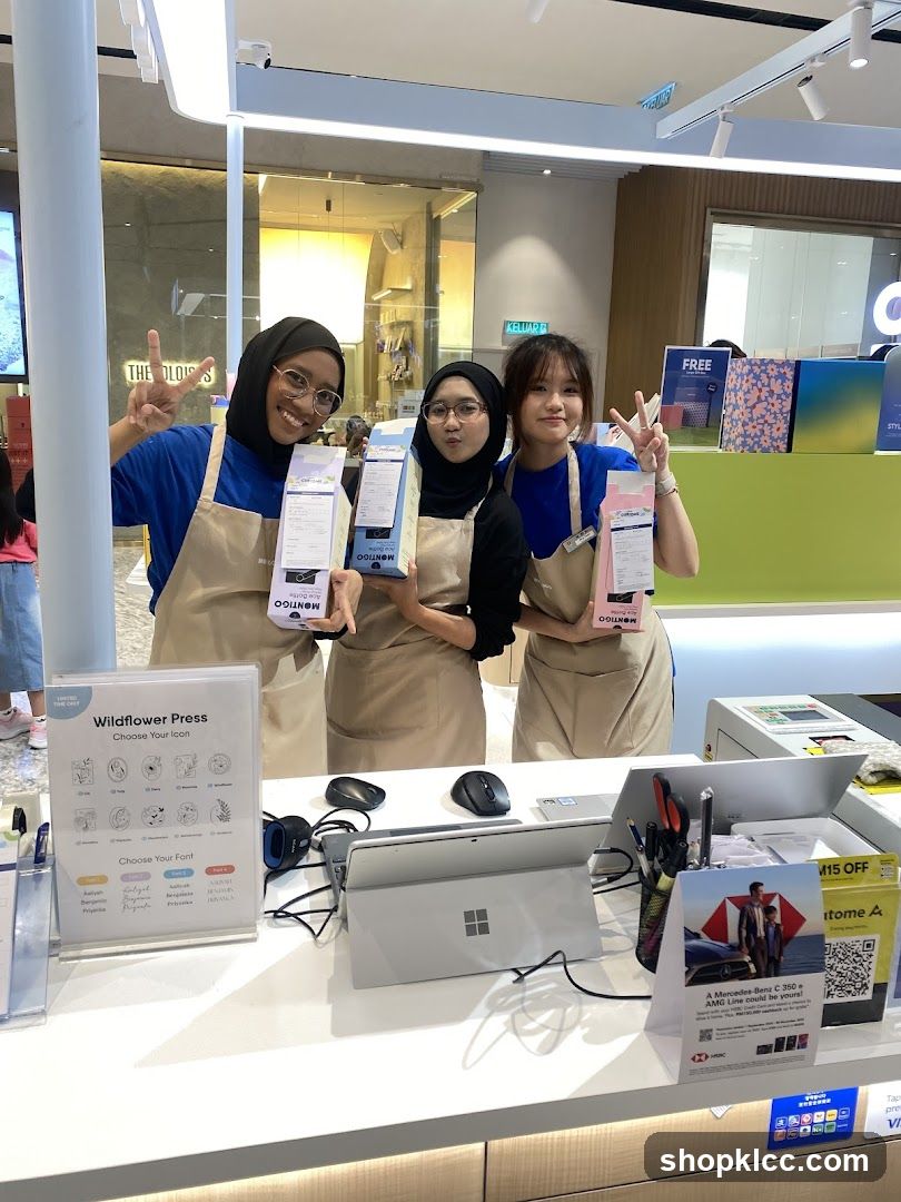 Staff holding product boxes