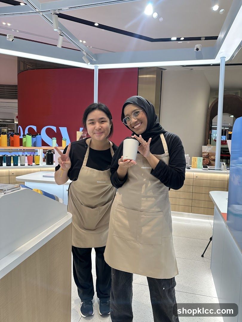 Two employees in aprons