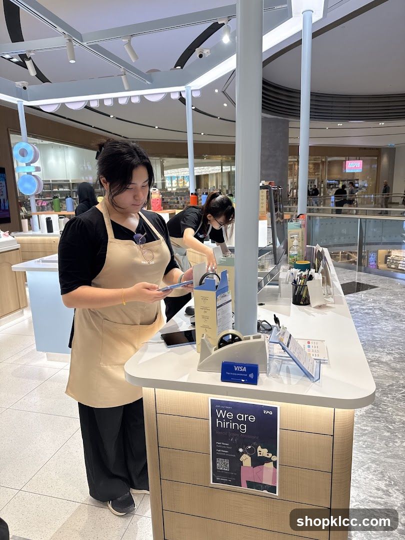 Retail staff at counter