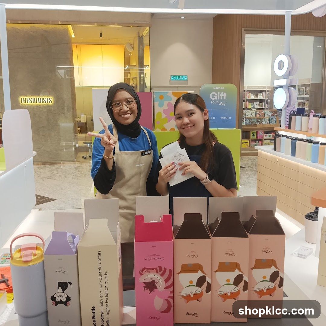 Two smiling women at a retail counter