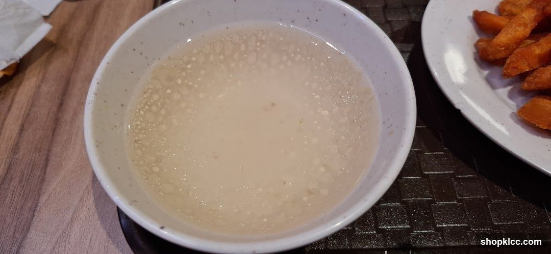 Bowl of Soup with Side Dish