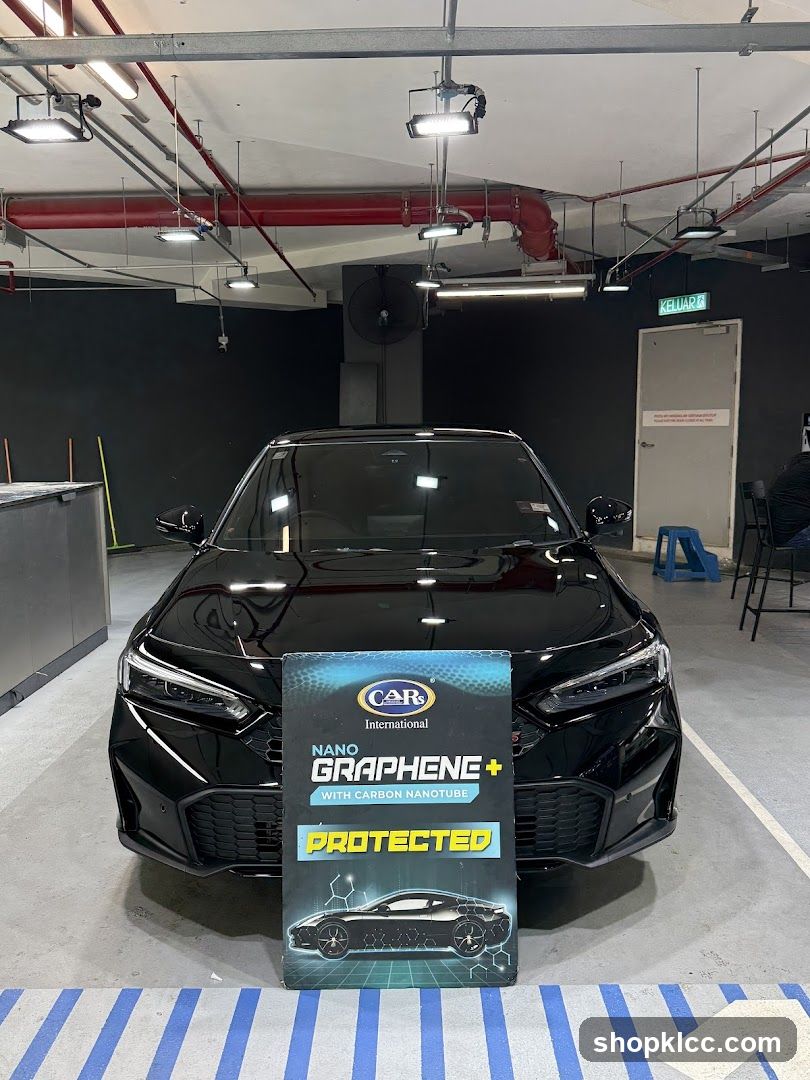 Car with Nano Graphene+ Protected Sign