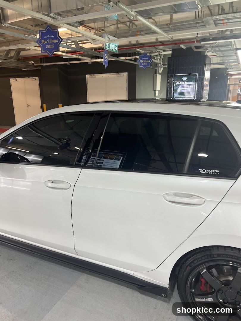 White Car with Tinted Windows