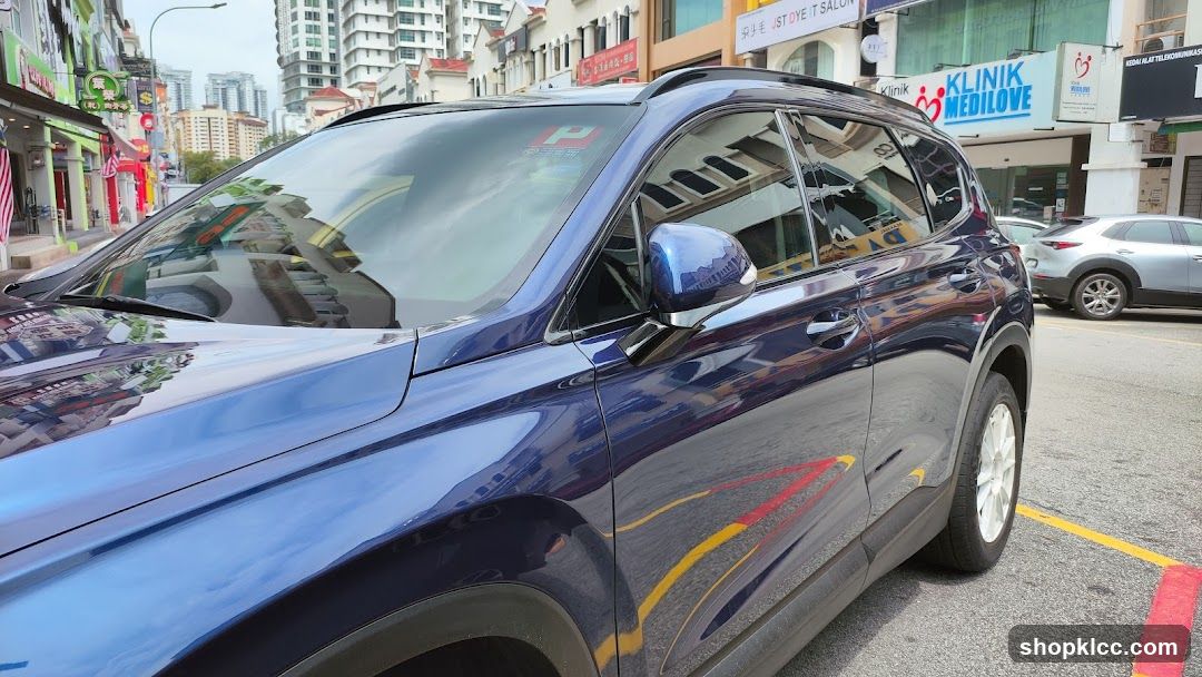 Reflections on a Blue Car