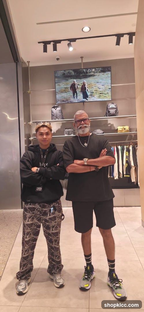 Two Men Posing in a Store