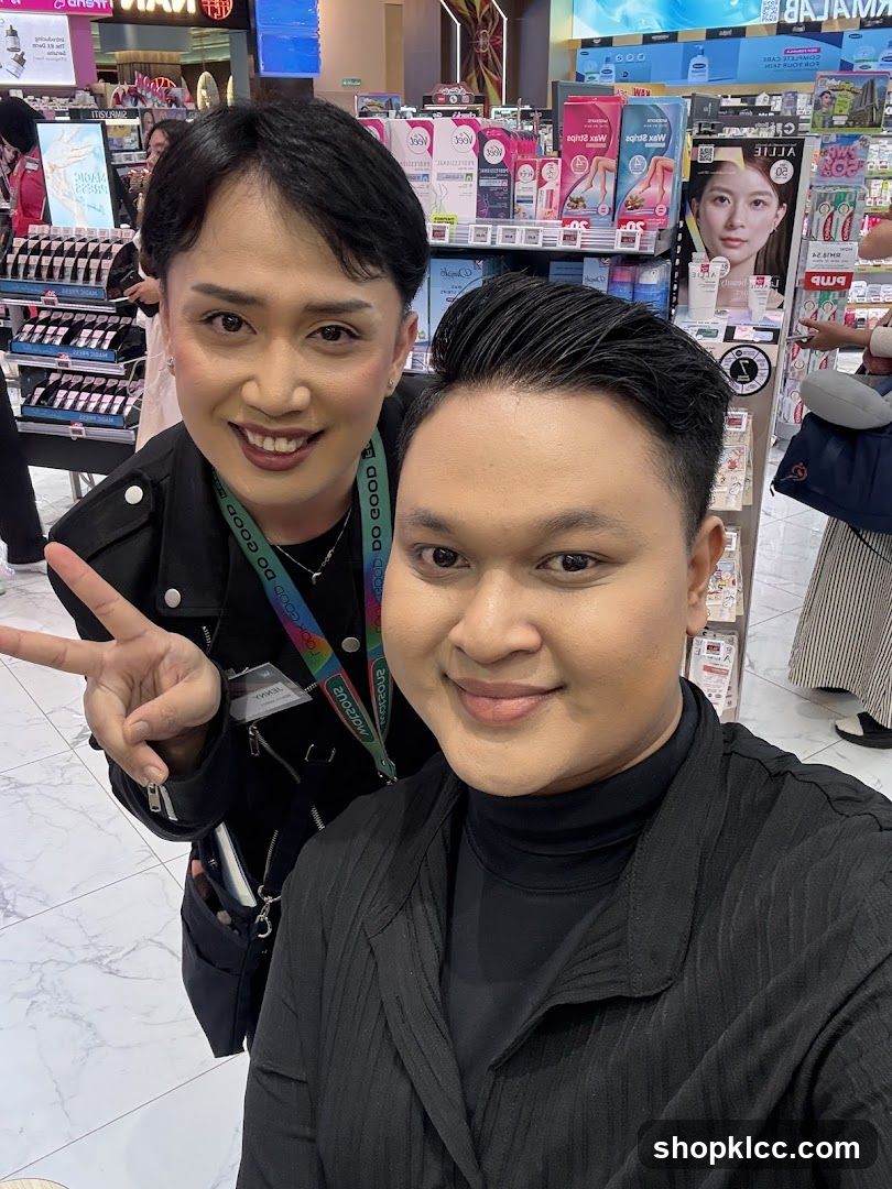 Two people posing for a selfie in a store