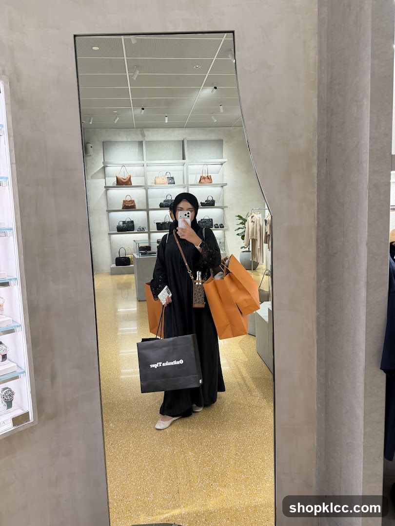Woman with Shopping Bags in Store