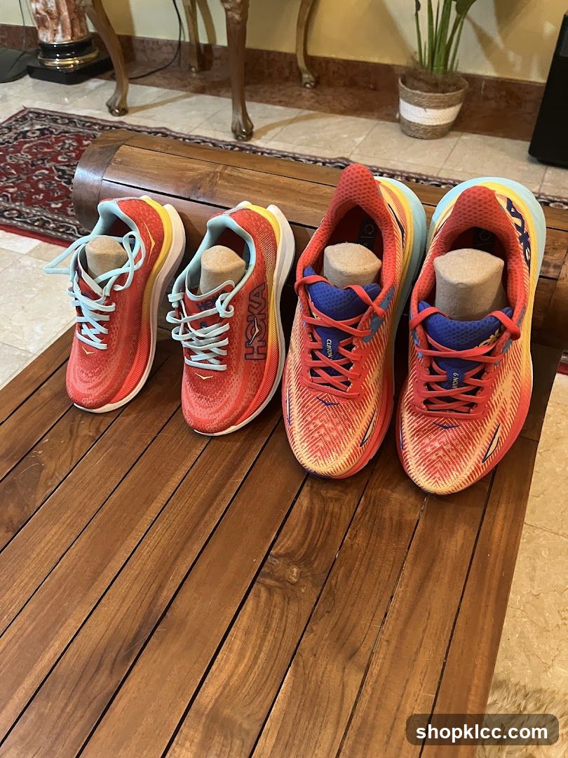 Two pairs of Hoka running shoes