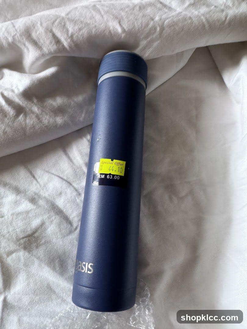 Blue Water Bottle with Price Tag