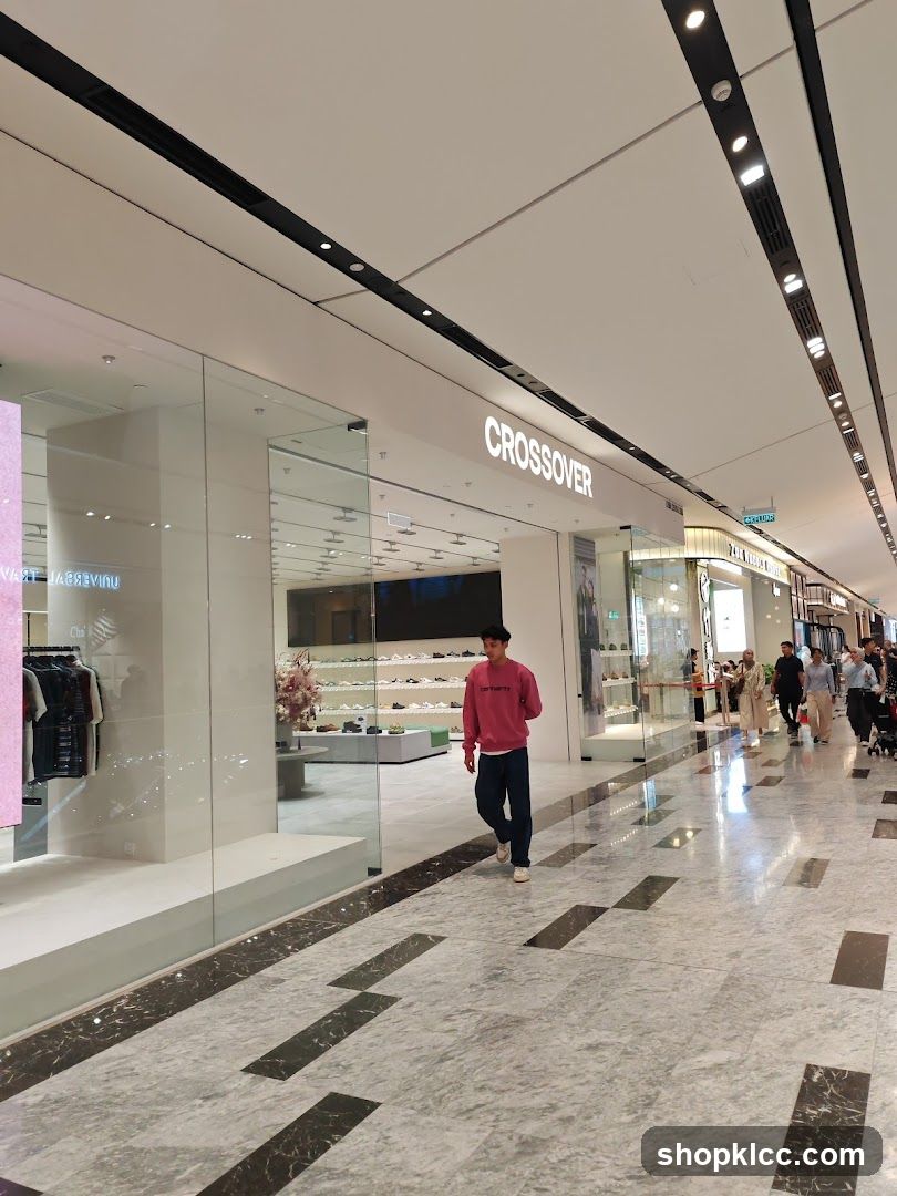 Man walking past a store