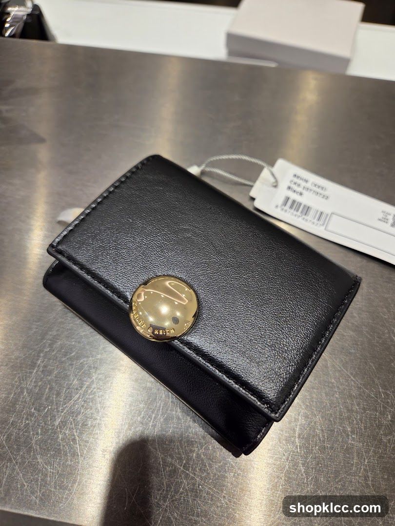 Black Wallet with Gold Button