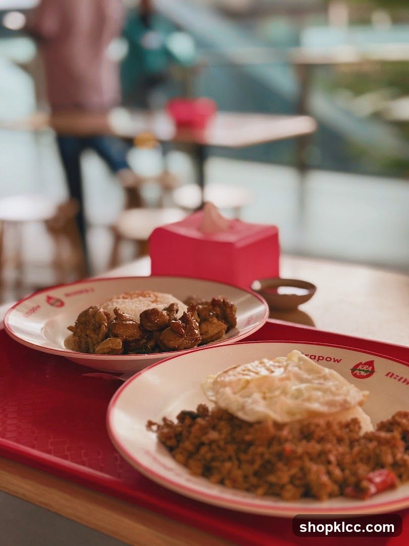 Two plates of food on a red tray