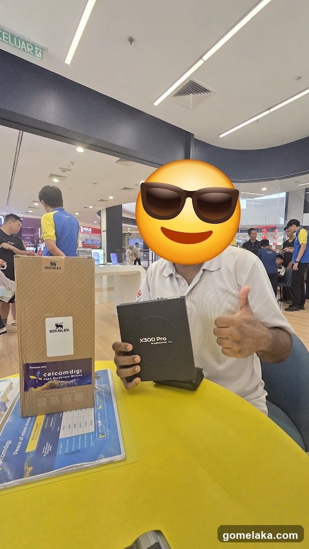 Person at retail counter holding product box