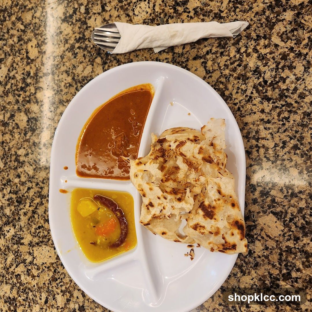 Roti Canai with Curry and Dal