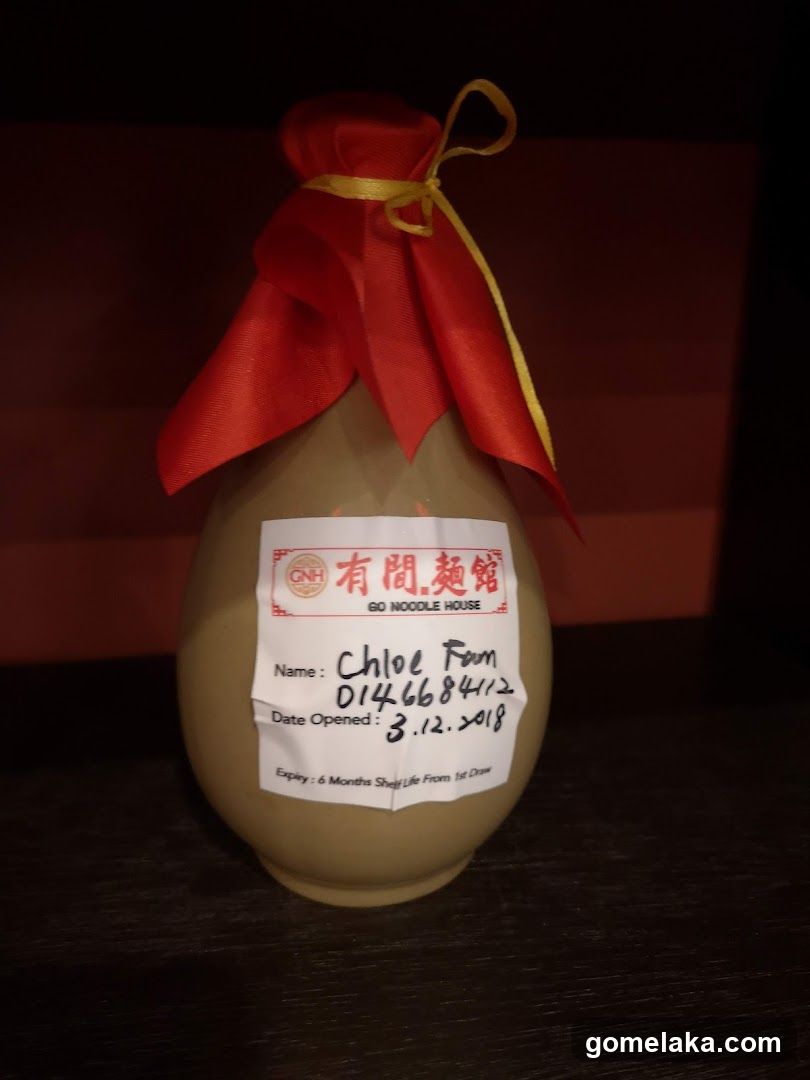 Bottle with Label from Go Noodle House