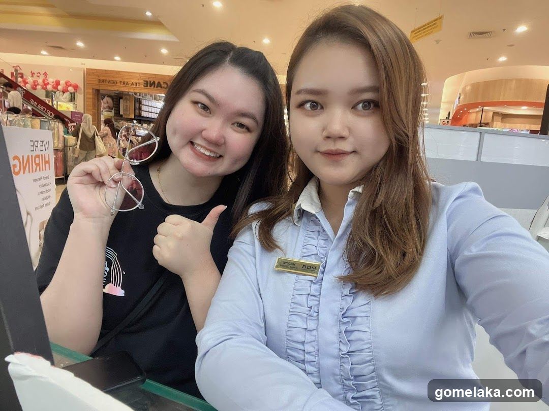 Two women at a shopping center counter