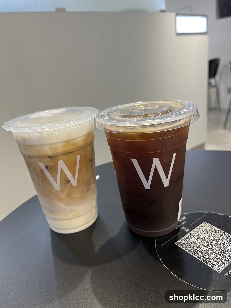 Two iced coffee drinks on a table