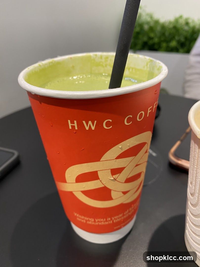 HWC Coffee Cup with Green Drink