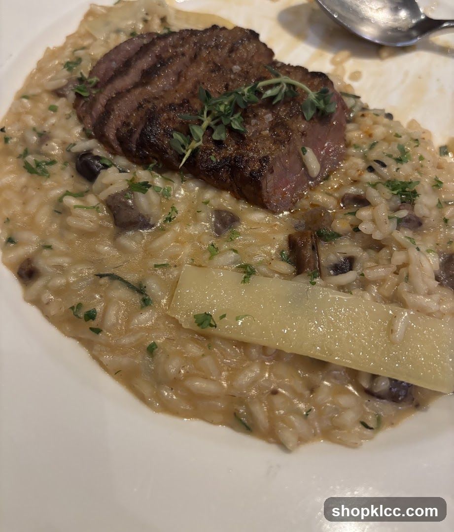 Rice dish with meat and garnish