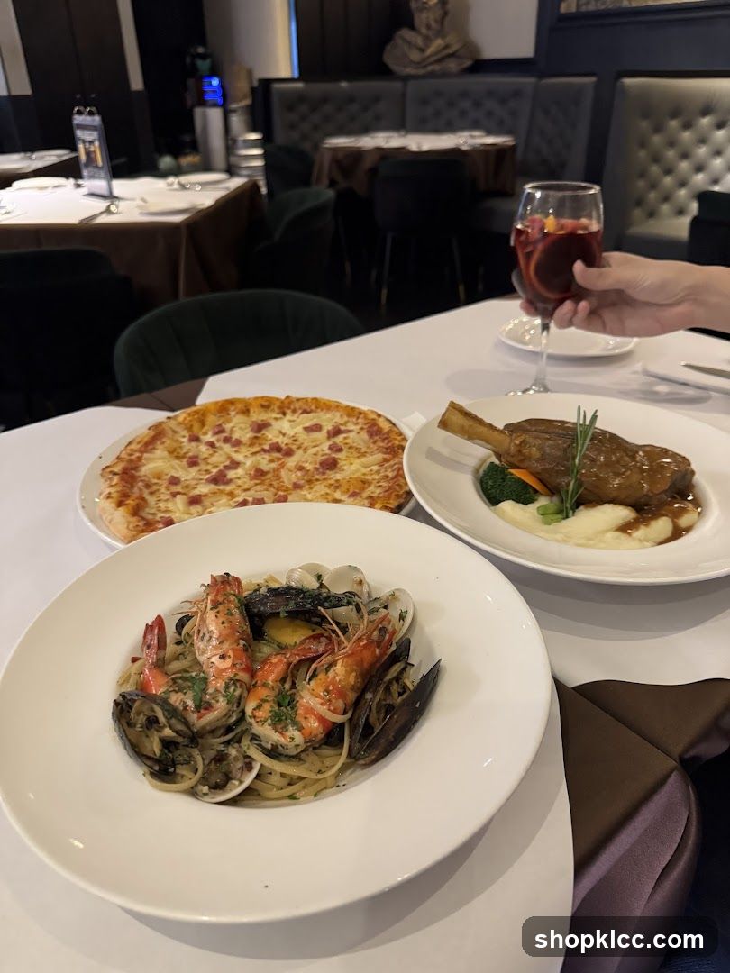 Dining Table with Seafood Pasta, Pizza, and Lamb Shank