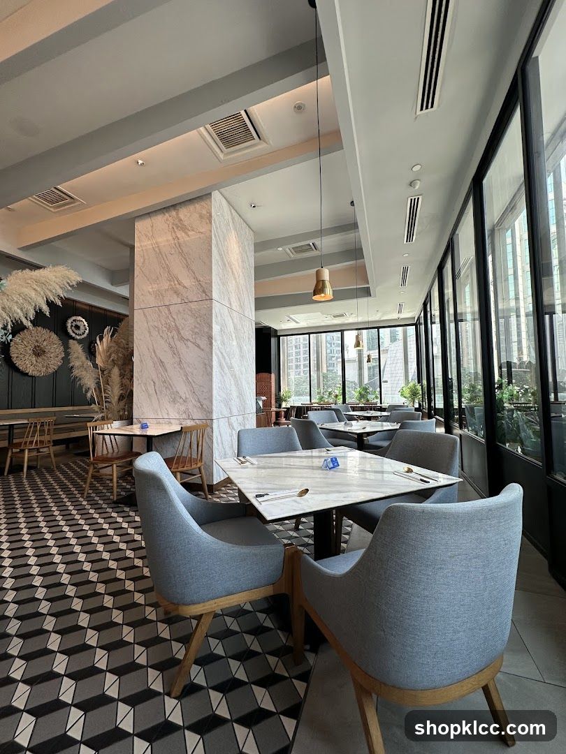 Modern Restaurant Interior with Geometric Tiles and Large Windows
