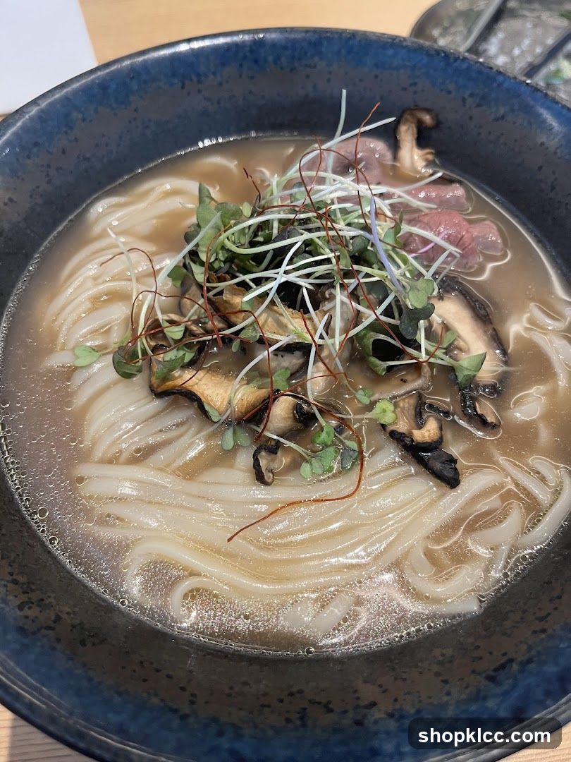 Bowl of Noodles with Mushrooms and Greens