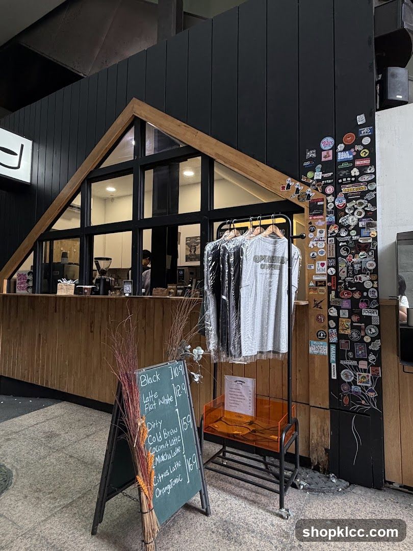 Coffee Shop Exterior with Menu and Merchandise