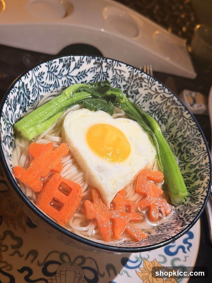 Bowl of noodles with egg and vegetables